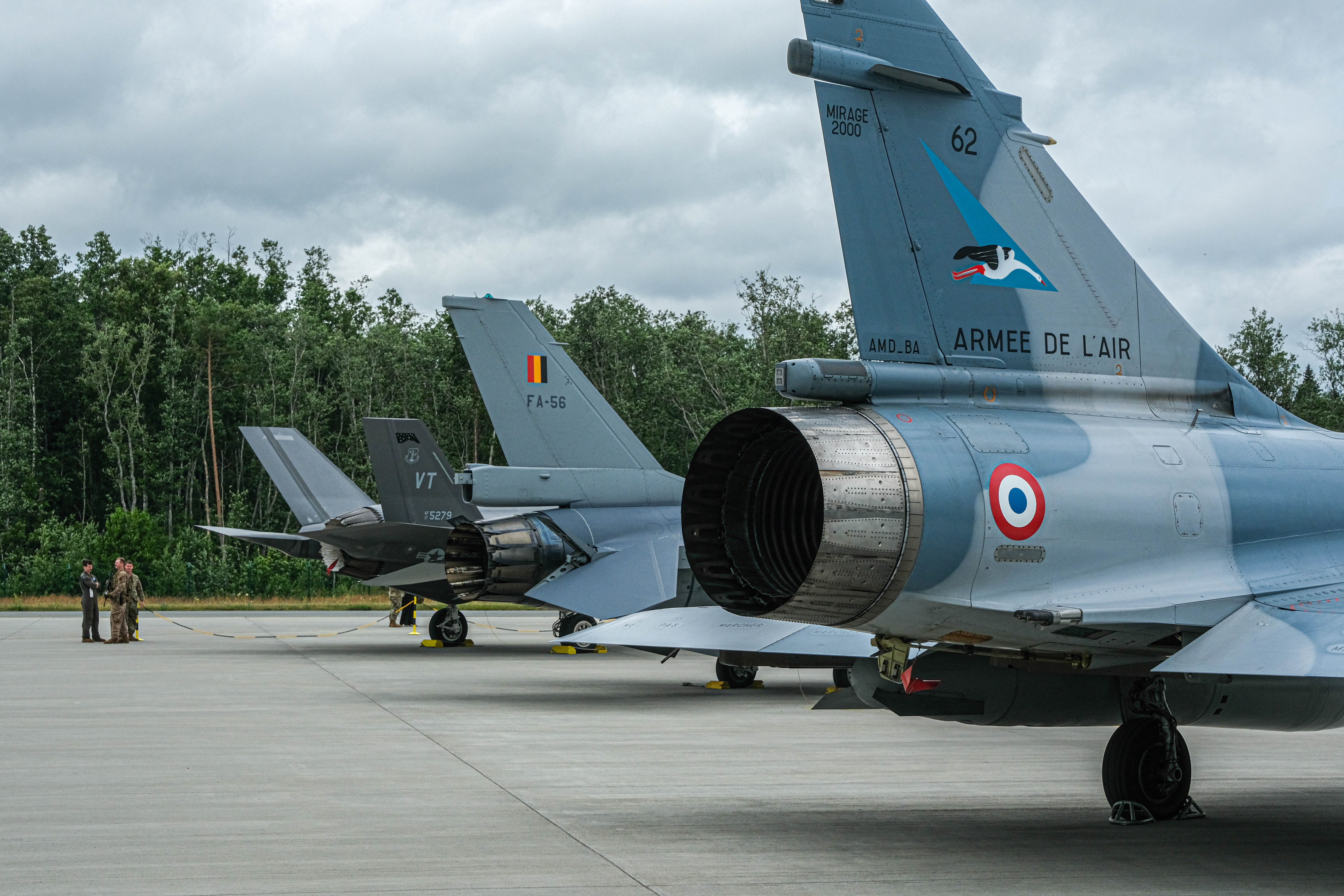 Image shows French and Belgium aircraft on the airfield.